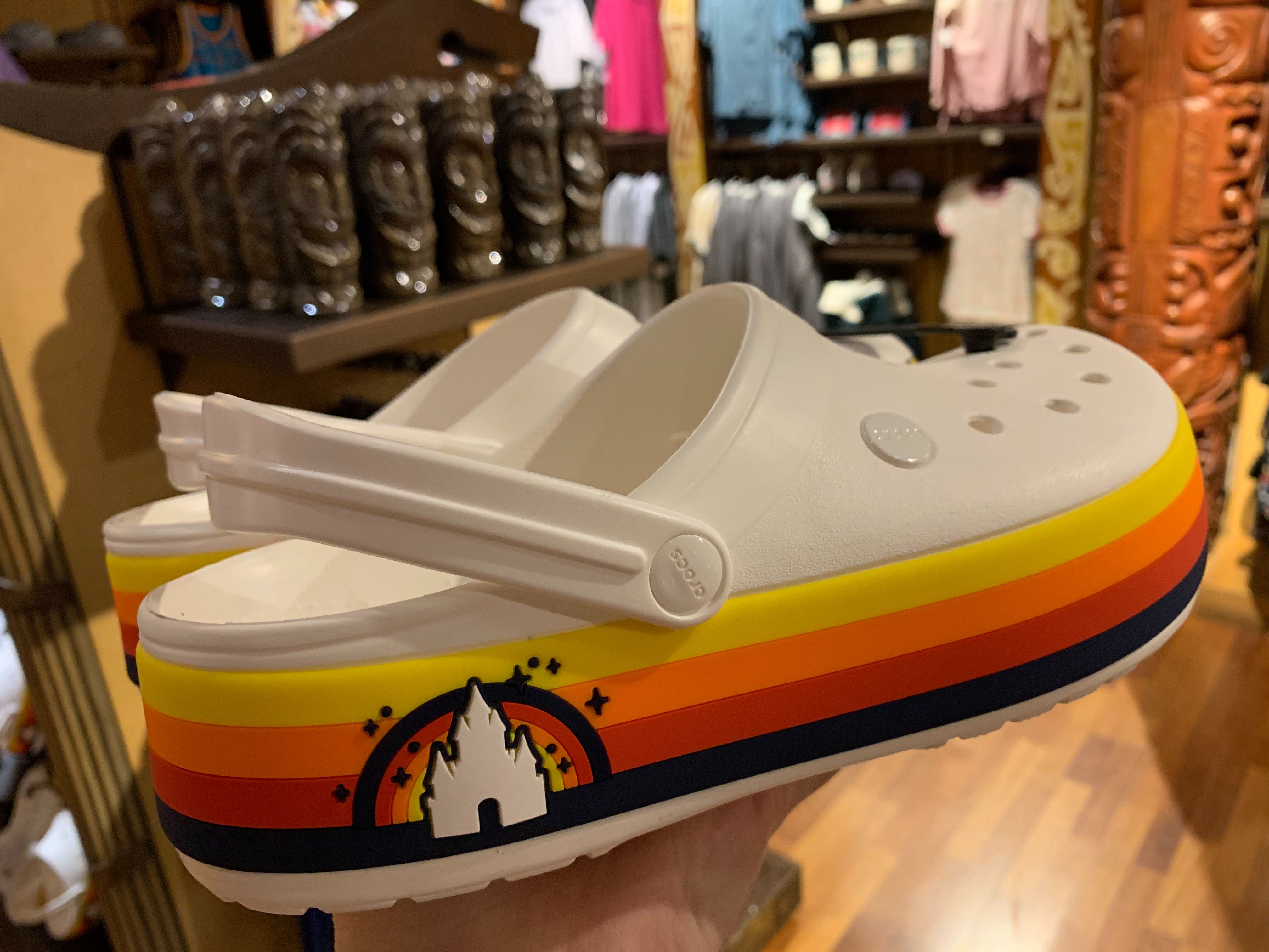 white crocs with rainbow