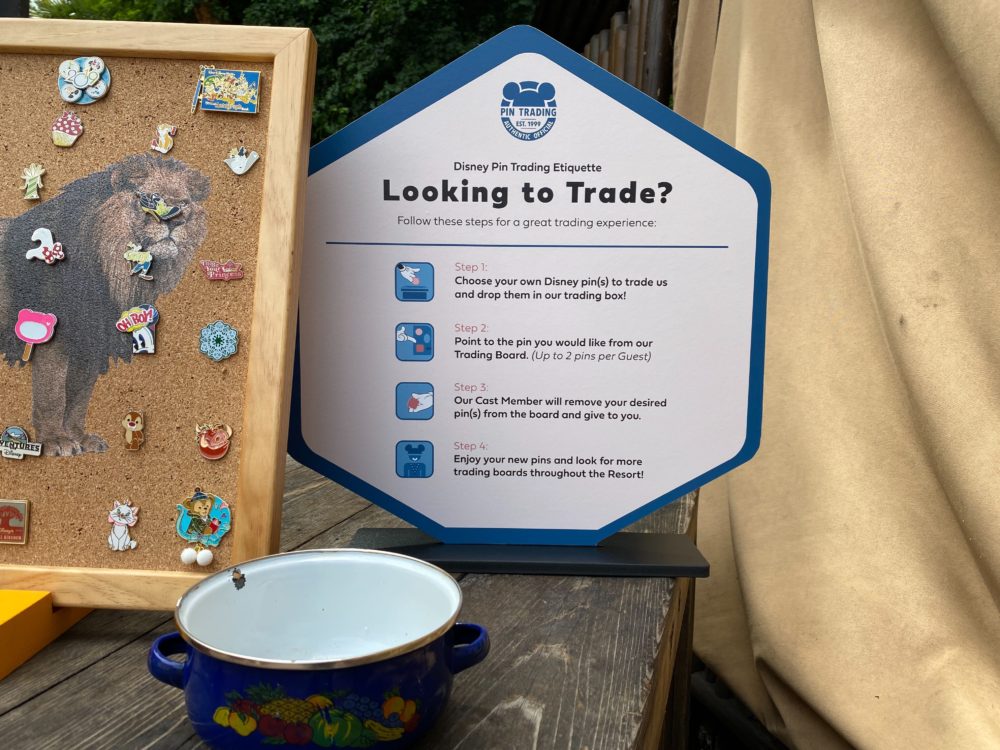 pin trading etiquette sign