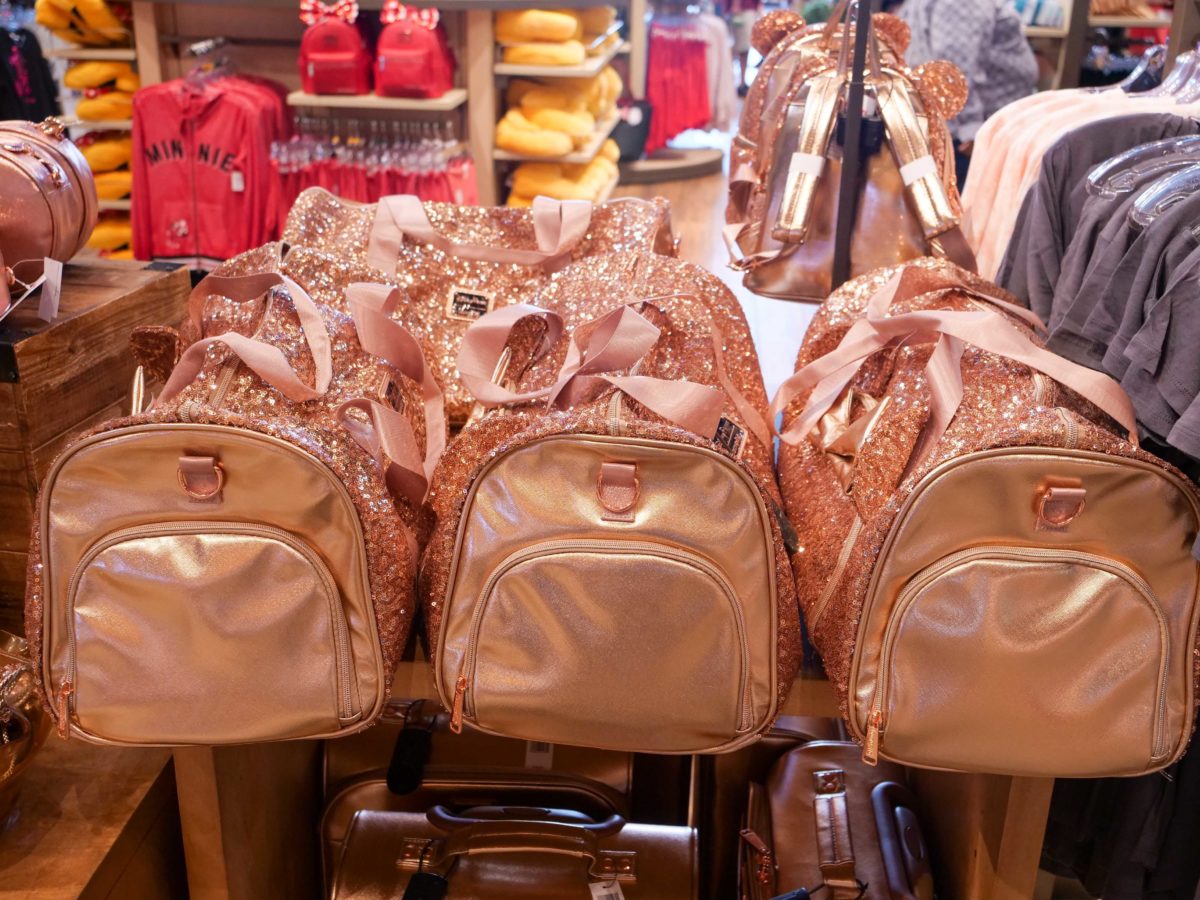 PHOTOS New Rose Gold Minnie Ear Duffel Bag by Loungefly Debuts at Disney Springs WDW News Today