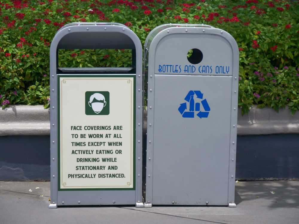 magic kingdom trash can signs